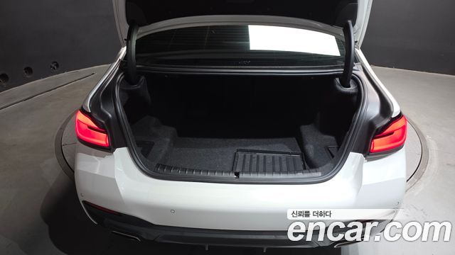 BMW 5-Series 2023 — photo 34