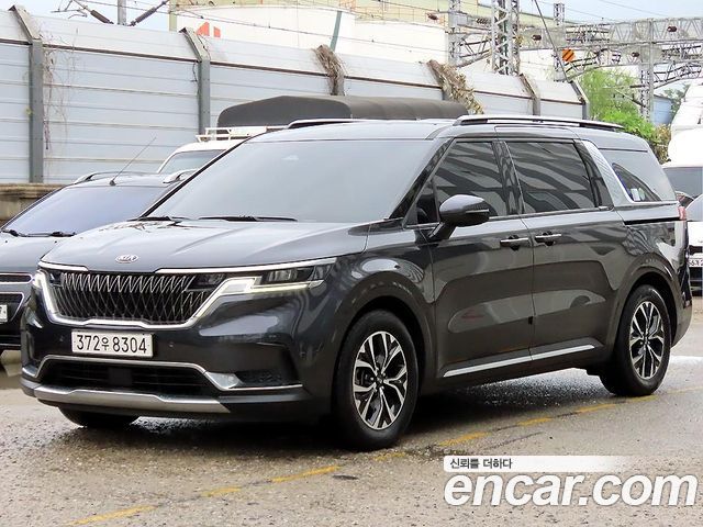 Kia Canival 2021 — photo 2