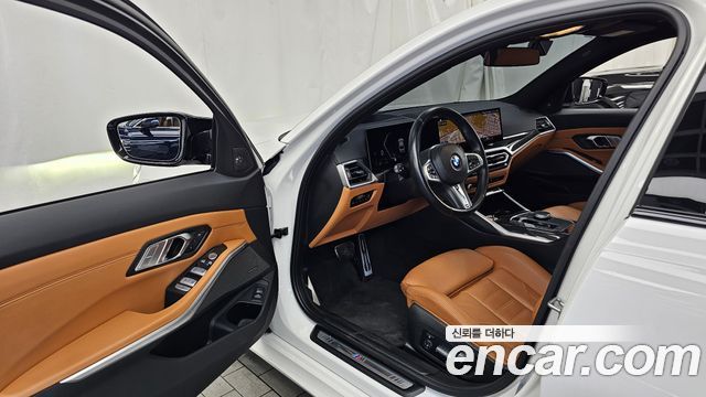 BMW 3-Series 2023 — photo 13