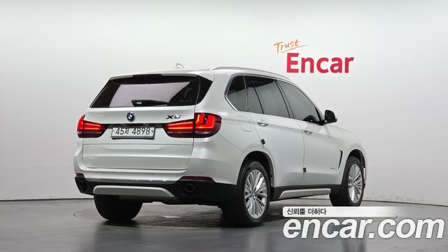 BMW X5 2014 — photo 2