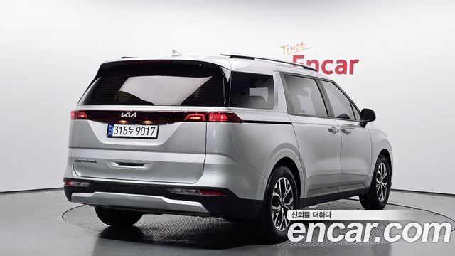 Kia Canival 2021 — photo 2