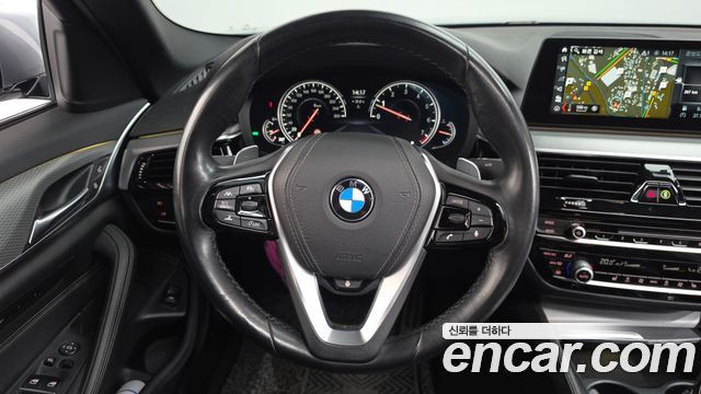 BMW 5-Series 2018 — photo 18