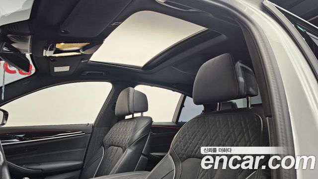 BMW 5-Series 2023 — photo 21
