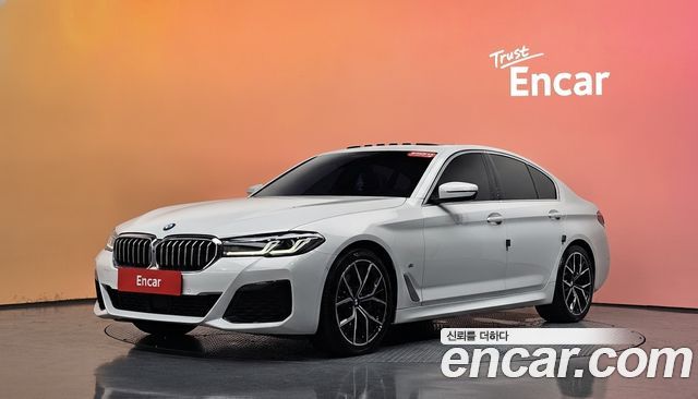 BMW 5-Series 2023 — photo 1