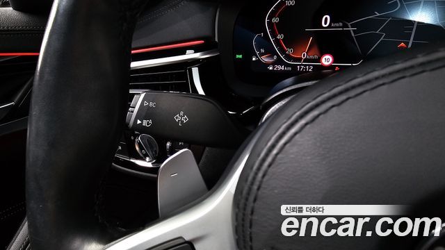 BMW 5-Series 2023 — photo 28