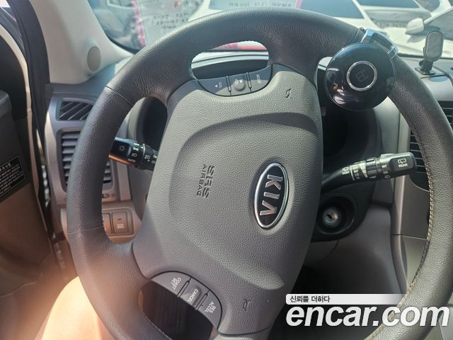 Kia Canival 2012 — photo 3
