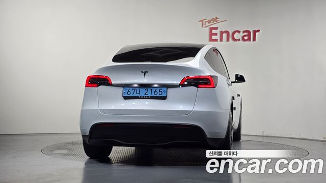 Tesla Model Y 2024 — photo 4