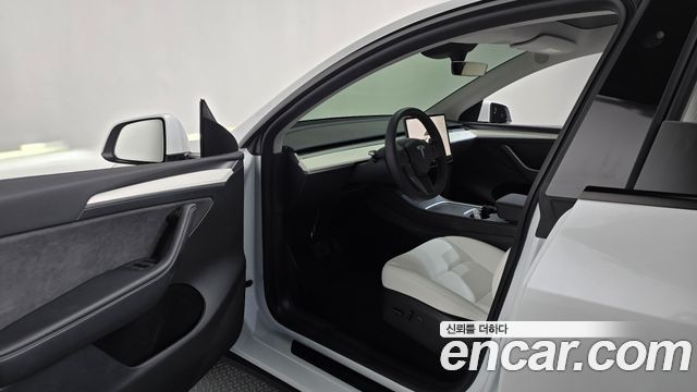 Tesla Model Y 2024 — photo 13