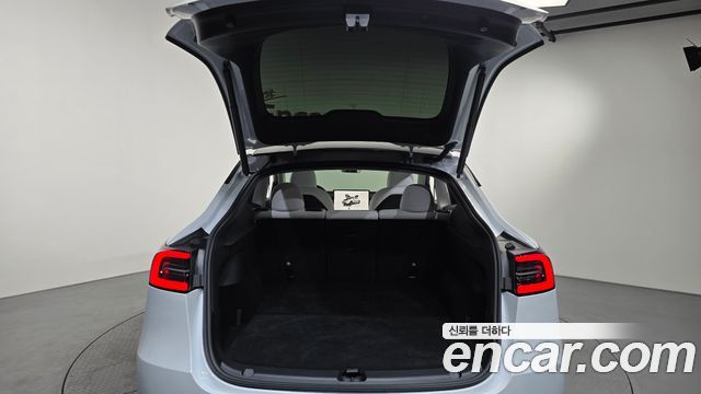 Tesla Model Y 2024 — photo 20