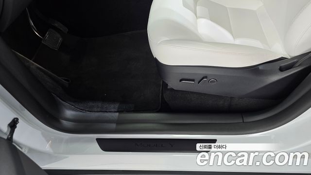 Tesla Model Y 2024 — photo 23