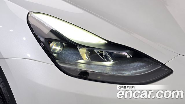 Tesla Model Y 2024 — photo 8