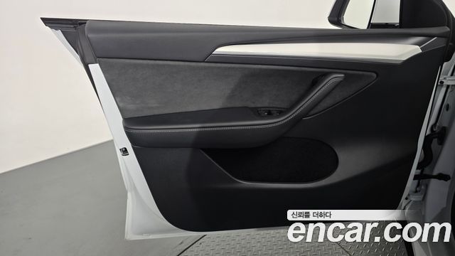 Tesla Model Y 2024 — photo 14