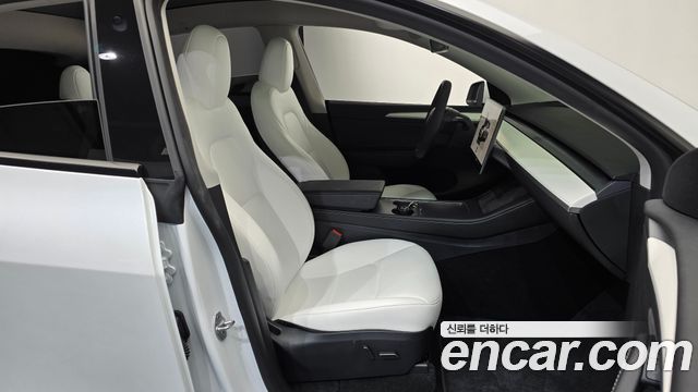 Tesla Model Y 2024 — photo 16