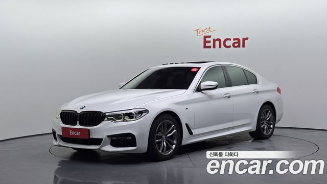 BMW 5-Series 2018 — photo 1