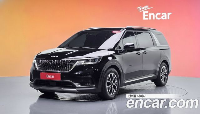 Kia Canival 2023 — photo 1