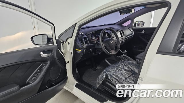 Kia K3 2015 — photo 13