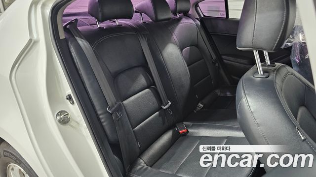 Kia K3 2015 — photo 17