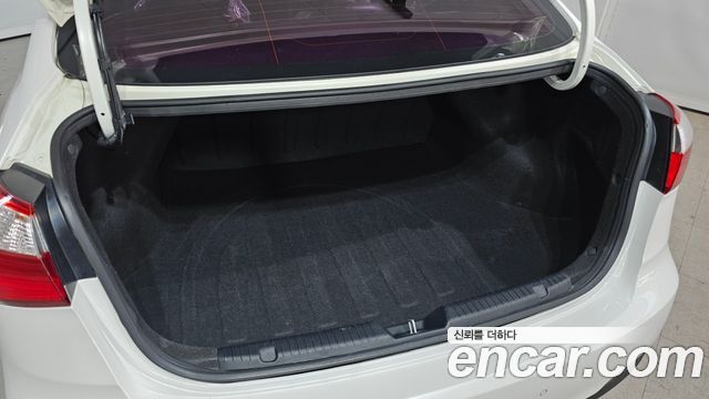 Kia K3 2015 — photo 24