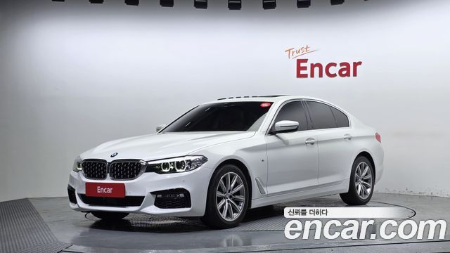 BMW 5-Series 2018 — photo 1