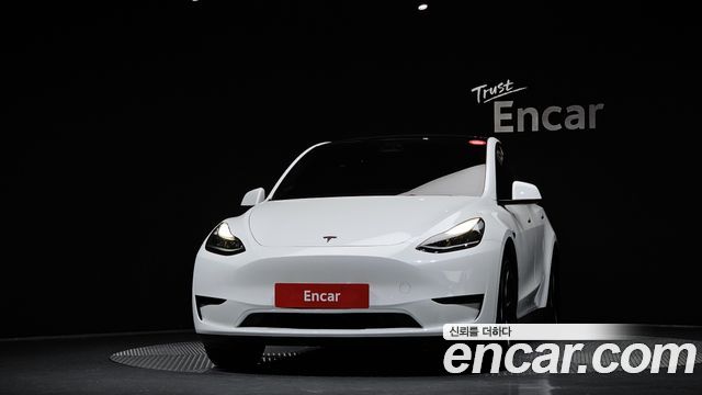 Tesla Model Y 2023 — photo 3