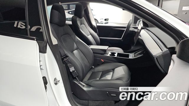 Tesla Model Y 2023 — photo 18