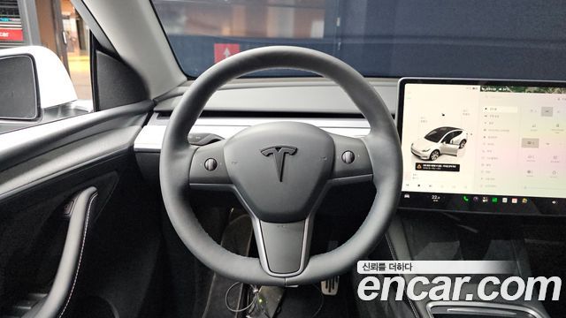 Tesla Model Y 2023 — photo 19