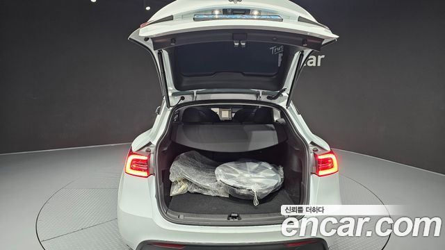 Tesla Model Y 2023 — photo 31