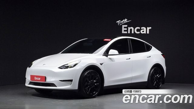 Tesla Model Y 2024 — photo 31
