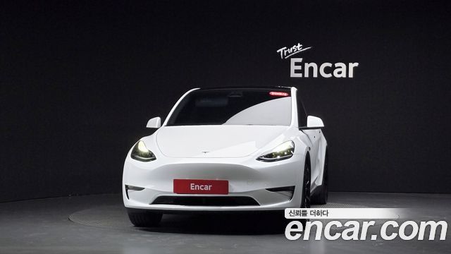Tesla Model Y 2024 — photo 3