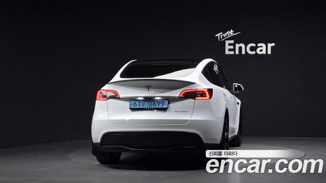 Tesla Model Y 2024 — photo 4