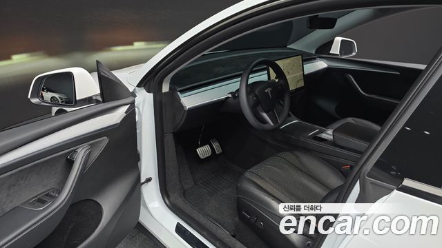 Tesla Model Y 2024 — photo 13