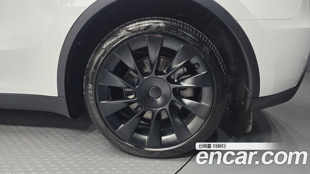 Tesla Model Y 2024 — photo 7