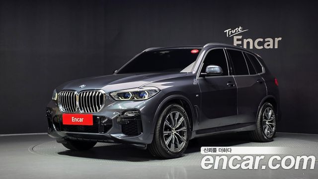 BMW X5 2021 — photo 1