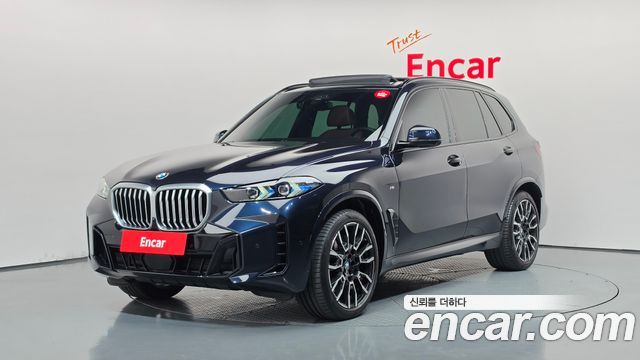 BMW X5 2024 — photo 1