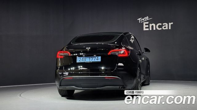 Tesla Model Y 2024 — photo 4
