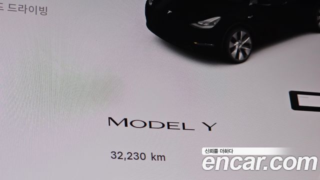 Tesla Model Y 2024 — photo 11