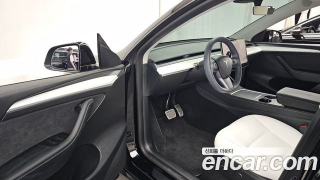 Tesla Model Y 2024 — photo 13