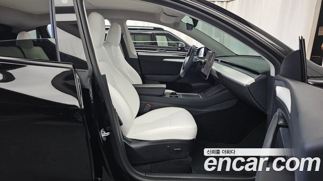 Tesla Model Y 2024 — photo 17