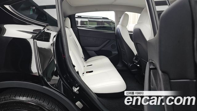 Tesla Model Y 2024 — photo 18