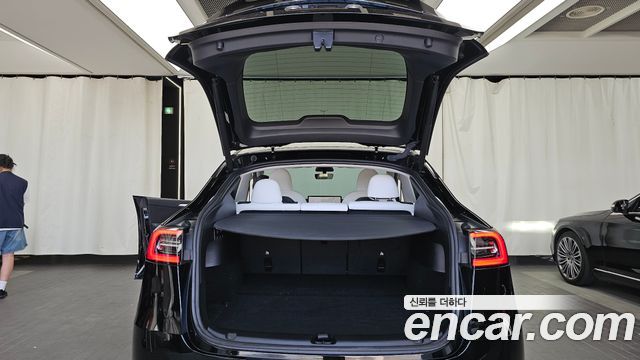 Tesla Model Y 2024 — photo 26