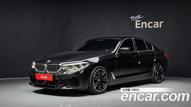 BMW 5-Series 2019 — photo 1