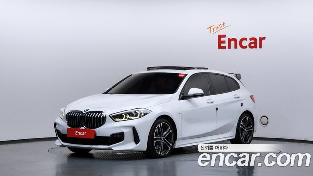 BMW 1-Series 2021 — photo 1