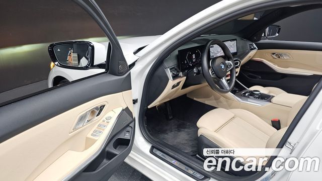 BMW 3-Series 2024 — photo 13