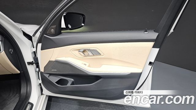 BMW 3-Series 2024 — photo 14
