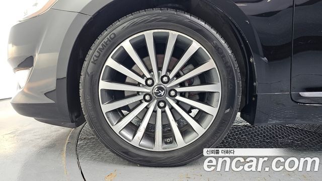 Kia K7 2012 — photo 5