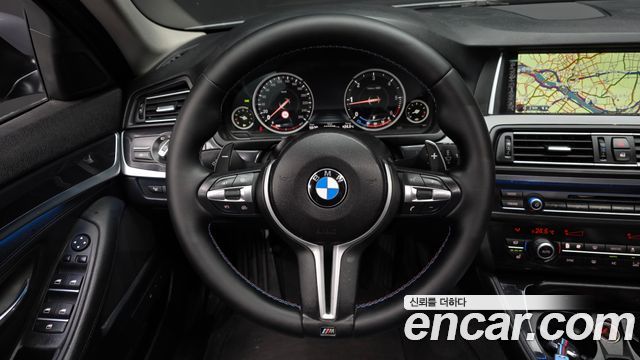 BMW 5-Series 2015 — photo 13