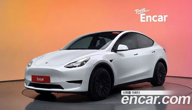 Tesla Model Y 2023 — photo 1