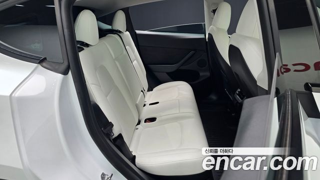 Tesla Model Y 2023 — photo 16