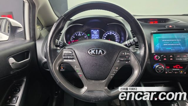 Kia K3 2014 — photo 15