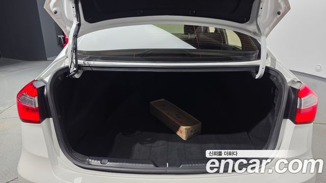 Kia K3 2014 — photo 20